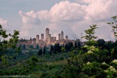 Historic Centre of San Gimignano - San Gimignano rises on top of a hill, 334 metres above sea level. The 14 medieval towers of San Gimignano are clearly visible from a...