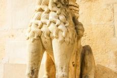 Cathedral of St James in Šibenik - The Cathedral of St. James in Šibenik: One of the sculpted lions of the Lion Gate. The columns of the Lion Gate are supported by two...
