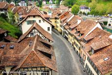 Old City of Bern - A cobbled street lined with medieval houses in the Mattequartier, a historic district in the Old City of Bern, viewed from the...