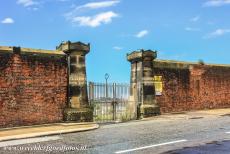 Liverpool - Mercantile City - Liverpool - Maritime Mercantile City: The impressive Dock Wall and the main entrance gate into Clarence Dock. The wall was built of red...