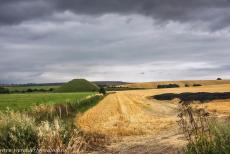 Silbury Hill - Silbury Hill is surrounded by the landscape of the English county of Wiltshire. The chalk and clay mound was excavated several... Silbury Hill - Silbury Hill is surrounded by the landscape of the English county of Wiltshire. The chalk and clay mound was excavated several...