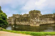 Beaumaris Castle - Castles and Town Walls of King Edward in Gwynedd: The outer wall and the moat of Beaumaris Castle. The lower outer wall was defended by...