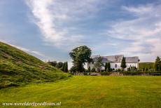 Jelling Mounds, Runic Stones and Church - Jelling Mounds, Runic Stones and Church: The present church was built in the Romanesque style in 1100. The Jelling Mounds, the Runic Stones...