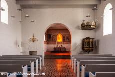 Jelling Mounds, Runic Stones and Church - Jelling Mounds, Runic Stones and Church: The simply furnished interior of the Jelling Church. In 2000, after extensive study at the National...