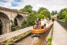 Pontcysyllte Aqueduct - Chirk Aqueduct: A narrowboat on the Llangollen Canal, on the right hand side the entrance into the Chirk Tunnel. The Llangollen Canal is 73,...