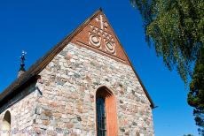 Church Village of Gammelstad, Luleå - Church Town of Gammelstad, Luleå: The east gable of the Nederluleå Church with a brick relief and a loop-hole. The...