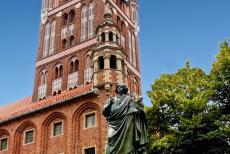 Medieval Town of Toruń - Medieval Town of Toruń: The Copernicus Monument in front of the Toruń Old Town Hall. The Toruń Old Town Hall dates back to the end of the 14th...