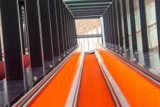 Zollverein Coal Mine Industrial Complex in Essen - Zollverein Coal Mine Industrial Complex, Essen: The modern escalator leading up to the former coal washing plant. The bright orange escalator was...