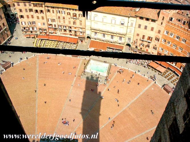 Historic Centre of Siena - Historic Centre of Siena: The Piazza del Campo and the Gaia Fountain, the Mangia Tower casts a long shadow across the square. The Piazza del Campo...