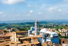 Historic Centre of Siena - The historic town of Siena seen from the Mangia Tower. The historic town of Siena is dominated by Siena Cathedral. The exterior of the...