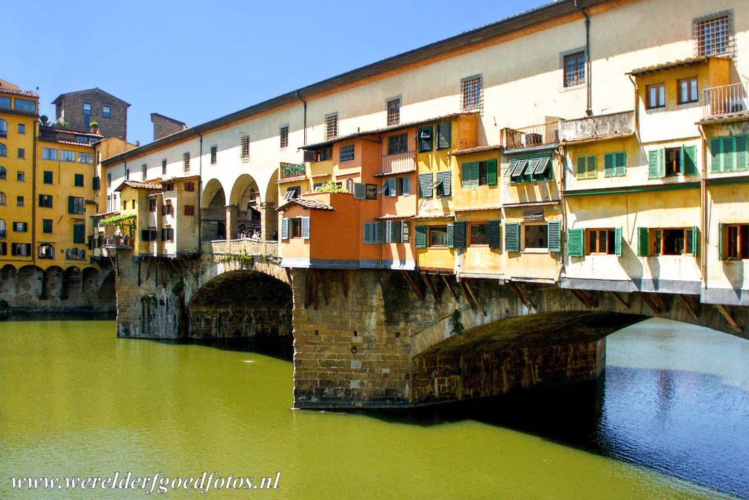 Historic Centre of Florence - The Ponte Vecchio is the oldest and most famous bridge in Florence. The bridge spans the river Arno. The Ponte Vecchio is lined on both sides...