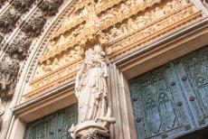 Cologne Cathedral - Cologne Cathedral: The main portal and the statue of the Blessed Virgin Mary. The cathedral houses numerous treasures. The relics...