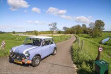 Dutch Water Defence Lines - Defence Line of Amsterdam: A classic Mini in front of Fortress Spijkerboor. Fortress Spijkerboor is situated in the Beemster Polder....