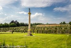 Sanssouci Palace in Potsdam - Palaces and Parks of Potsdam and Berlin: A column with statue in front of Sanssouci Palace and the terraced gardens. Sanssouci...