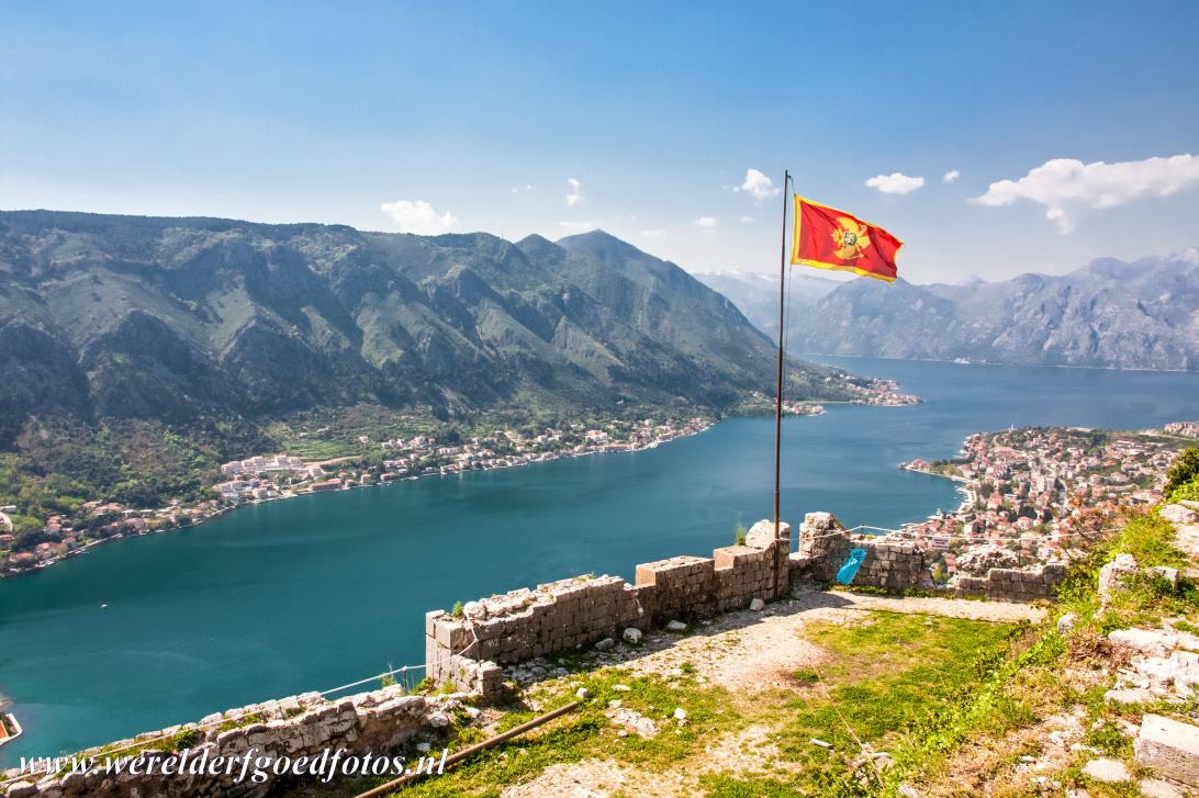 Natural and Culturo-Historical Region of Kotor - Kotor and the Bay of Kotor: The Montenegrin flag stands atop the fortress of San Giovanni. The Bay of Kotor is also known as Boka...