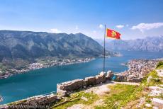 Natural and Culturo-Historical Region of Kotor - Kotor and the Bay of Kotor: The flag of Montenegro stands atop the the Fortress San Giovanni, the Fortress of St. John. The Bay of Kotor&nbsp;is...