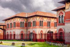 Crespi d'Adda - Crespi d'Adda: The office buildings behind the main gate to cotton factory of the Crespi Family. The offices of the factory are...