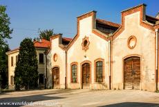 Crespi d'Adda - Crespi d'Adda: The buildings of the former cotton factory of the Crespi Family. The walls of the factory are white-washed and the windows and...