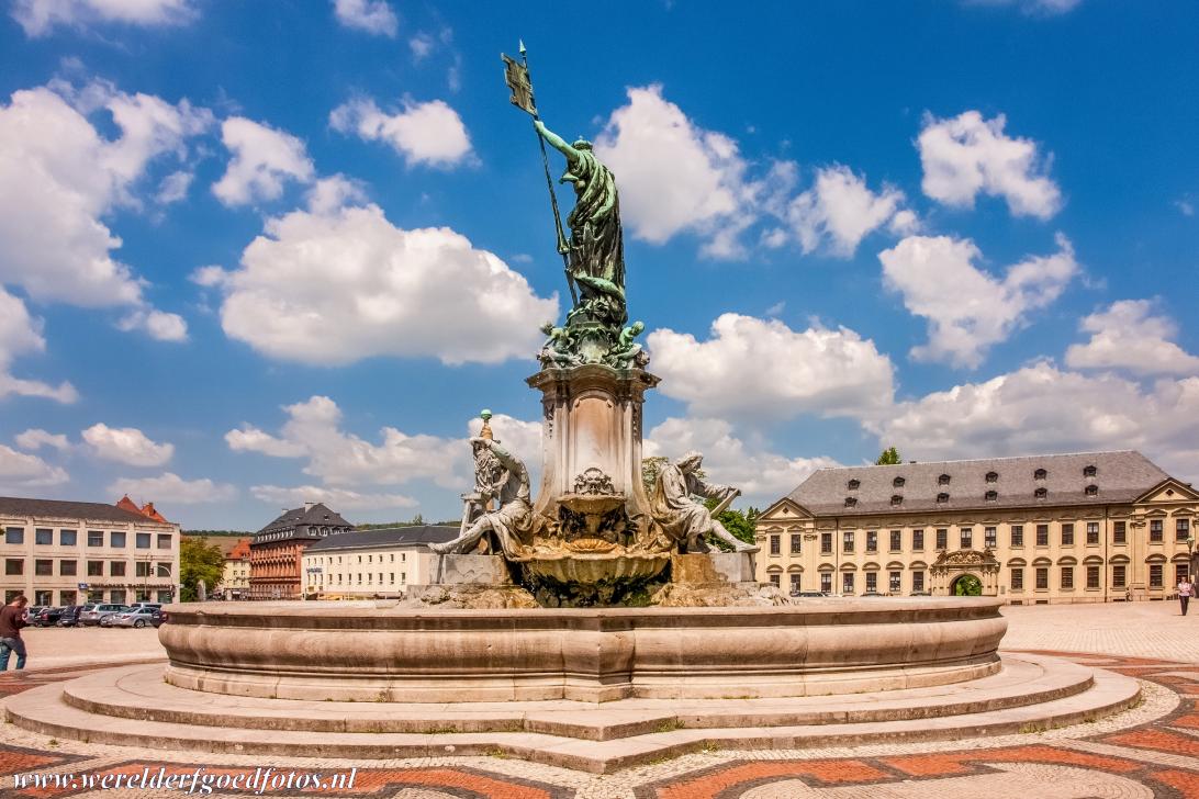Würzburg Residence - The Frankonia Fountain on the Cour d'Honneur, the Residence Square, in front of the Würzburg Residence. The fountain was created in... Würzburg Residence - The Frankonia Fountain on the Cour d'Honneur, the Residence Square, in front of the Würzburg Residence. The fountain was created in...