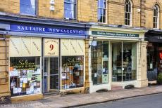 Saltaire, a Victorian model village - Saltaire, a workers' village: Shops along Saltaire Road. The first row of shops was completed on Victoria Road in 1854, including a post...