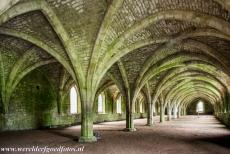 Studley Royal Park - ruins of Fountains Abbey - Studley Royal Park including the ruins of Fountains Abbey: The cellarium of the abbey was used to store food, ale and wines. A river is...