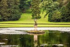 Studley Royal Park - ruins of Fountains Abbey - Studley Royal Park including the ruins of Fountains Abbey: The statue of Neptune reflected in the water of the Moon Pond, there are several...