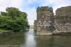 Beaumaris Castle - Castles and Town Walls of King Edward in Gwynedd: The outer wall and the moat of Beaumaris Castle. The lower outer wall was defended by...