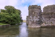 Beaumaris Castle - Castles and Town Walls of King Edward in Gwynedd: The&nbsp;outer wall and the moat of Beaumaris Castle. The lower outer wall was defended by...