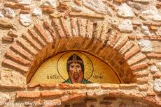 Monastery of Hosios Loukas - Above the entrance gate to the Monastery of Hosios Loukas is a small mosaic depicting Hosios Loukas, St. Luke. Behind the entrance...