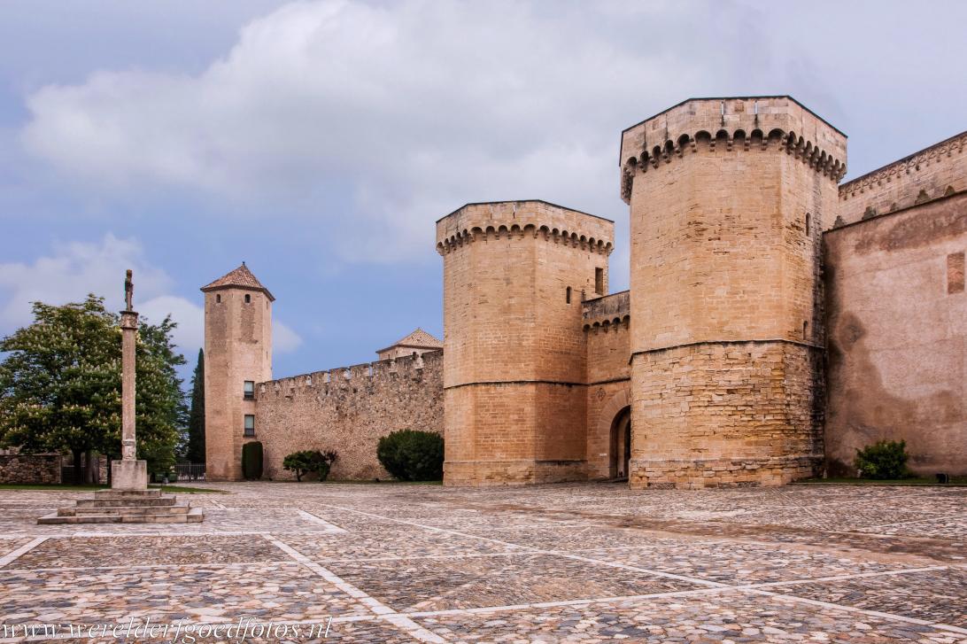 Poblet Monastery - Access to the Poblet Monastery is through the Porta Reial, the Royal Gate, the gate is flanked by two huge towers. The Royal Gate was built... Poblet Monastery - Access to the Poblet Monastery is through the Porta Reial, the Royal Gate, the gate is flanked by two huge towers. The Royal Gate was built...