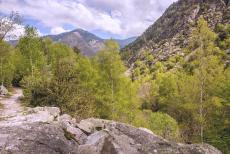 Madriu-Perafita-Claror Valley - The Madriu-Perafita-Claror Valley in Andorra is a rugged and imposing landscape of cliffs and glaciers featuring open pastures and steep wooded...