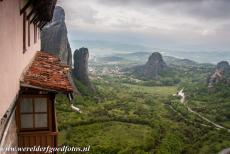 Monasteries of Meteora - Meteora viewed from the Holy Monastery of Roussanou. The monastery is towering high above the small Greek towns of Kalambaka and...