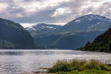 Geirangerfjord and Nærøyfjord - West Norwegian Fjords - Geirangerfjord and Nærøyfjord: The snow-covered mountains around the Geirangerfjord. The amazing...