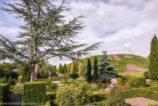 Jelling Mounds, Runic Stones and Church - Jelling Mounds, Runic Stones and Church: The north burial mound viewed from the Jelling Churchyard. The grave of King Gorm the Old was...