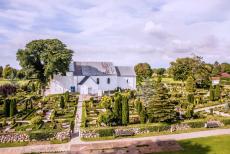 Jelling Mounds, Runic Stones and Church - Jelling Mounds, Runic Stones and Church: The remains of three wooden churches have been found underneath the present stone Jelling Church....