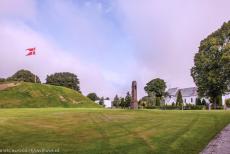 Jelling Mounds, Runic Stones and Church - Jelling Mounds, Runic Stones and Church: The Royal Standard of Denmark is raised on the Jelling Mounds every summer Sunday because the Jelling...