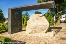 Jelling Mounds, Runic Stones and Church - Jelling Mounds, Runic Stones and Church: The runestone of King Harald Bluetooth. To prevent further damage from the weather, the Jelling...