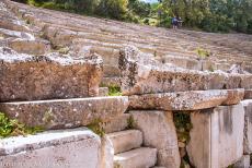 Sanctuary of Asklepios at Epidaurus - The limestone seats of the theatre at the Sanctuary of Asklepios at Epidaurus. The sanctuary is renowned for its ancient...
