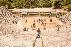 Sanctuary of Asklepios at Epidaurus - Sanctuary of Asklepios at Epidaurus: The theatre of Epidaurus and its circular stage viewed from the 55th row. The ancient theatre can...