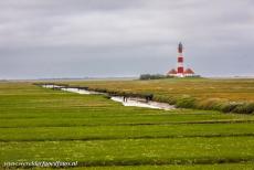 German part of the Wadden Sea - The German part of the Wadden Sea: The Westerheversand Lighthouse was built on a dwelling mound in 1907. The builings of the...