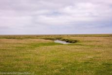 Duitse deel van de Waddenzee - De uitgestrekte zoutmoerassen in Nationaalpark Waddenzee in&nbsp;Sleeswijk-Holstein, het grootste nationaal park van Duitsland. De Waddenzee is...