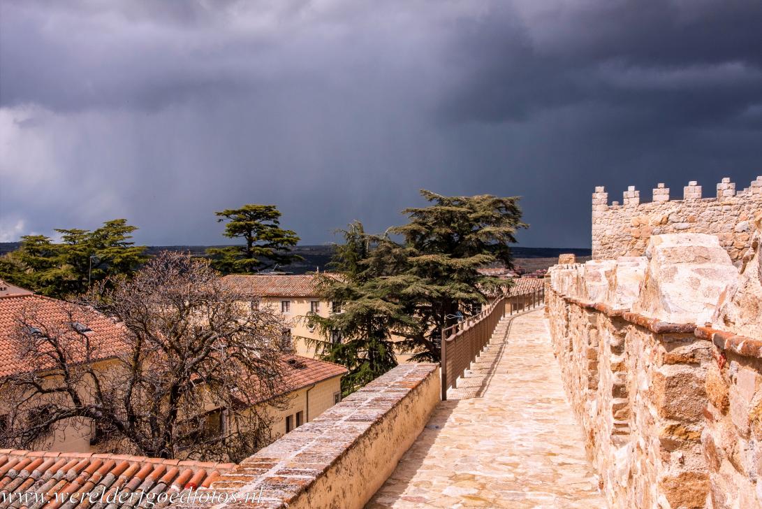 Old Town of &Aacute;vila - Old Town of &Aacute;vila with its Extra-Muros Churches: A heavy snow shower looms over the ancient town walls of &Aacute;vila. Large sections of...