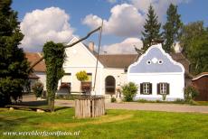 Fertö / Neusiedlersee Cultural Landscape - Fertö / Neusiedlersee Cultural Landscape: A draw well in front of a tiny house built in the South Bohemian Folk Baroque style in the village...