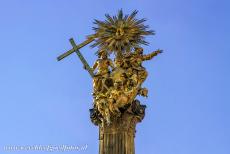 Holy Trinity Column in Olomouc - The gilded statue of the Holy Trinity on top of the Holy Trinity Column in Olomouc. The column was built in honour to God, the Roman Catholic...