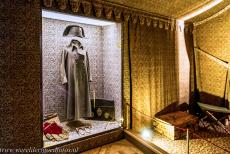 Palace and Park of Fontainebleau - The Palace and Park of Fontainebleau:&nbsp;The long coat and bicorne of Napoleon Bonaparte. One of the wings of the palace houses the Napoleon I...