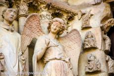 Kathedraal Notre-Dame, Reims - De kathedraal Notre-Dame, het voormalig klooster van Saint-Rémi en Paleis van Tau in Reims: De Lachende Engel in het noordportaal aan de...