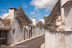 Trulli of Alberobello - The trulli of Alberobello: A small street lined with trulli. The history of the trulli dates back to the 15th century. Landowners...
