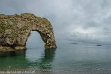 Kust van Dorset en Oost-Devon - De kust van Dorset en Oost-Devon: Durdle Door tijdens hoogtij op een vroege mistige ochtend. De kustlijn van Dorset en Oost-Devon is beroemd...