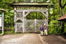 Białowieża Forest - The wooden entrance gate of the Polish Białowieża National Park. A part of the primeval forest of Białowieża is situated inside a...