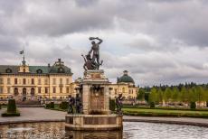 Royal Domain of Drottningholm - Royal Domain Drottningholm: The renowned Hercules Fountain, Drottningholm Palace in the background. The Hercules Fountain was created by the Dutch...